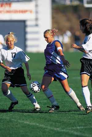 girls playing soccer