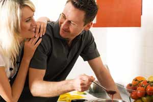 Couple Cooking in Kitchen
